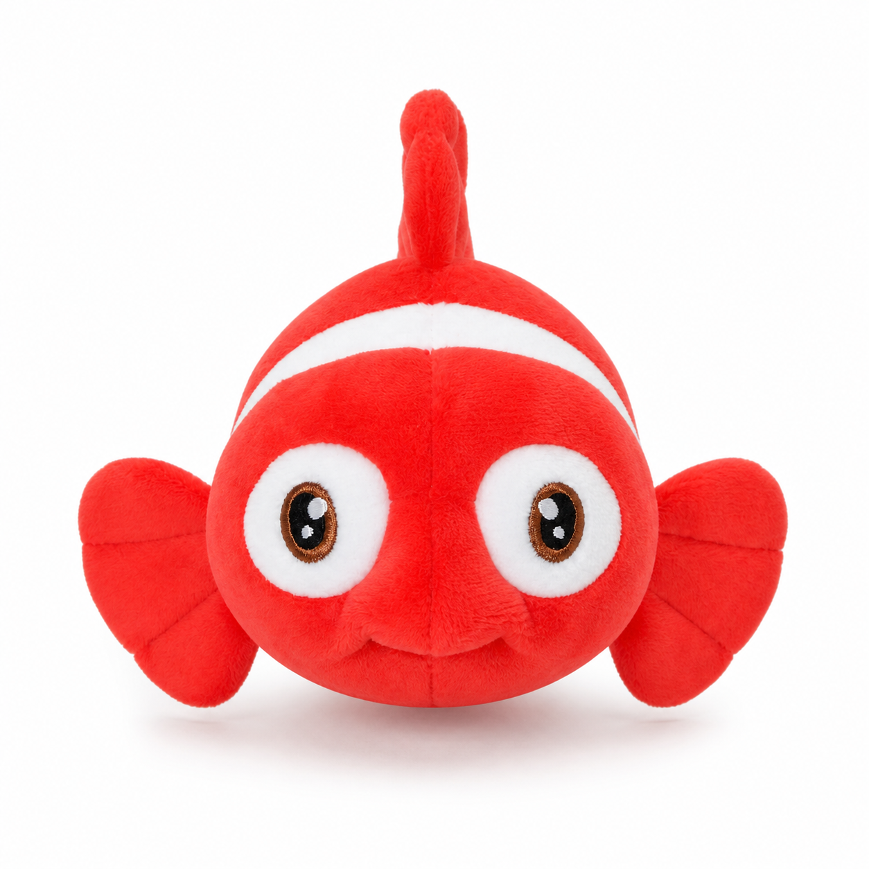 Front view of red clownfish plush toy with embroidered eyes and side fins