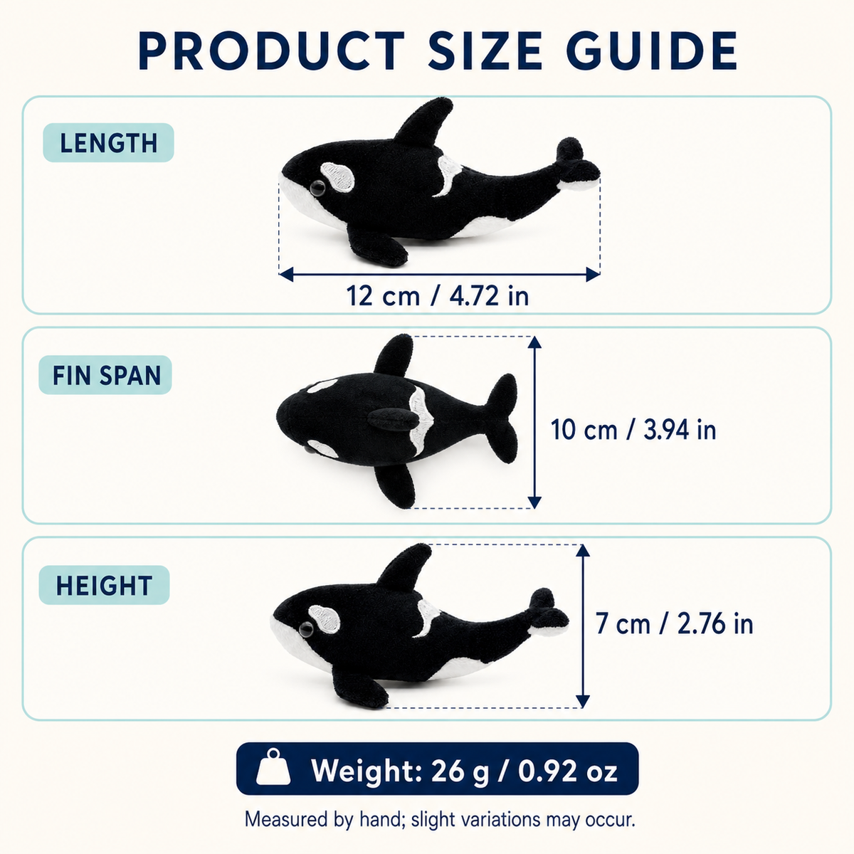 Mini orca plush keychain side view showing fins and tail