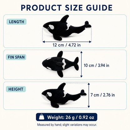 Mini orca plush keychain side view showing fins and tail